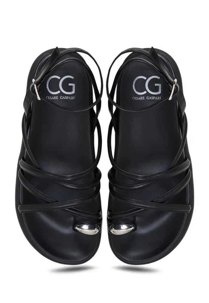 A stylish pair of women's leather strappy sandals, perfect for summer and a must-have fashion footwear piece.