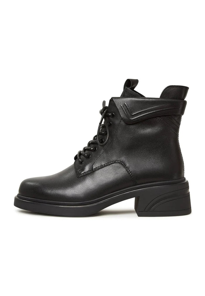A chic pair of stylish black ankle boots with block heels, perfect for a trendy and fashionable look.
