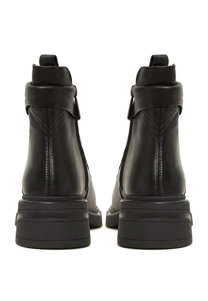 A pair of stylish black ankle boots with a trendy block heel design, perfect for a fashionable look.