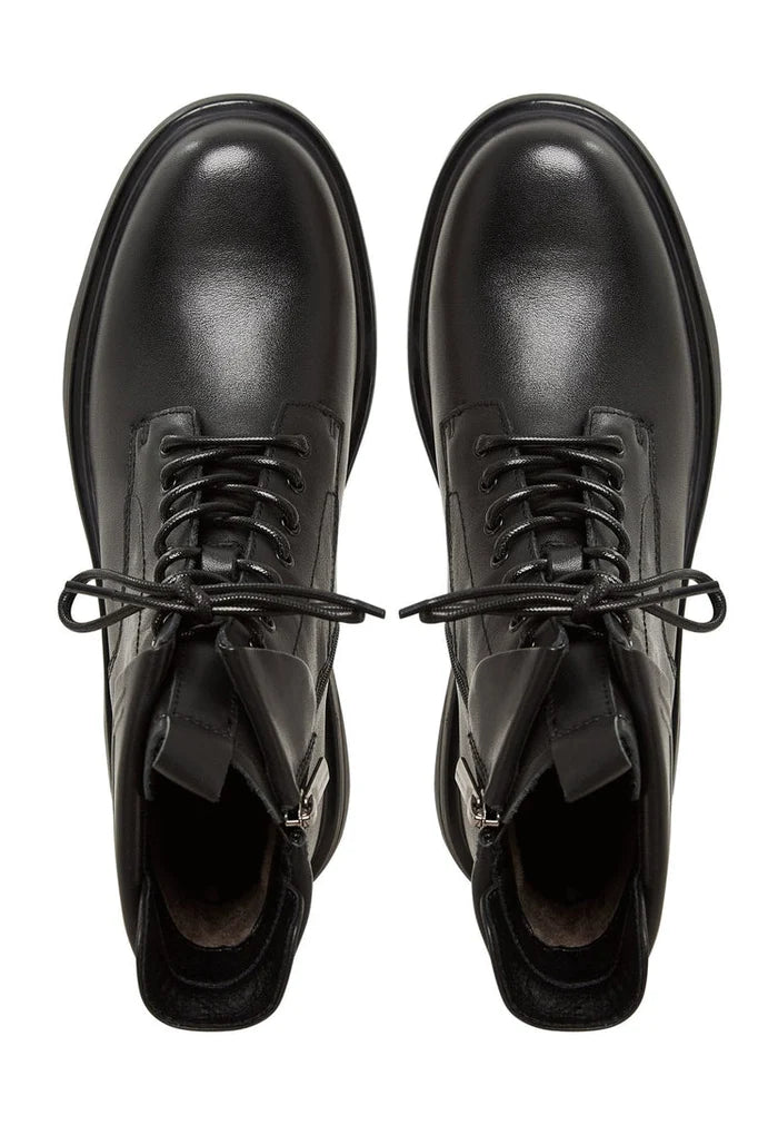 A pair of stylish black ankle boots with a trendy block heel, perfect for a fashionable look.