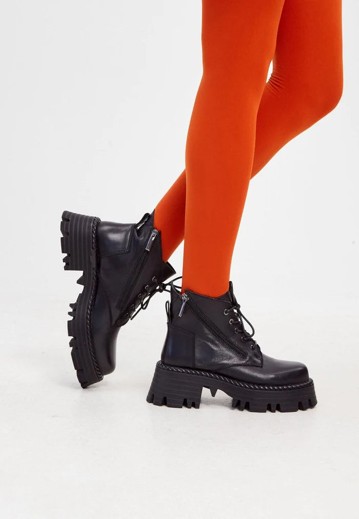 A pair of fashionable black lace-up ankle boots, perfect for adding a stylish touch to any outfit.