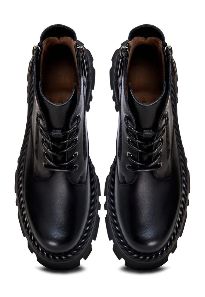 A pair of fashionable lace-up black ankle boots - the perfect stylish choice for any outfit.