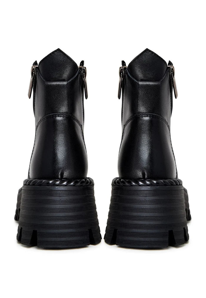 A trendy pair of lace-up ankle boots in black, perfect for any fashion-forward outfit.