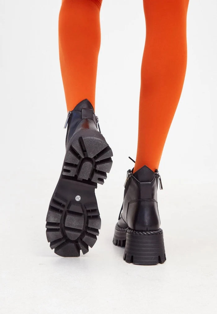 A pair of stylish lace-up black ankle boots, the perfect combination of fashion and function.