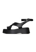 A trendy pair of women's black suede cross-strap sandals, perfect for summer with a stylish strappy design.