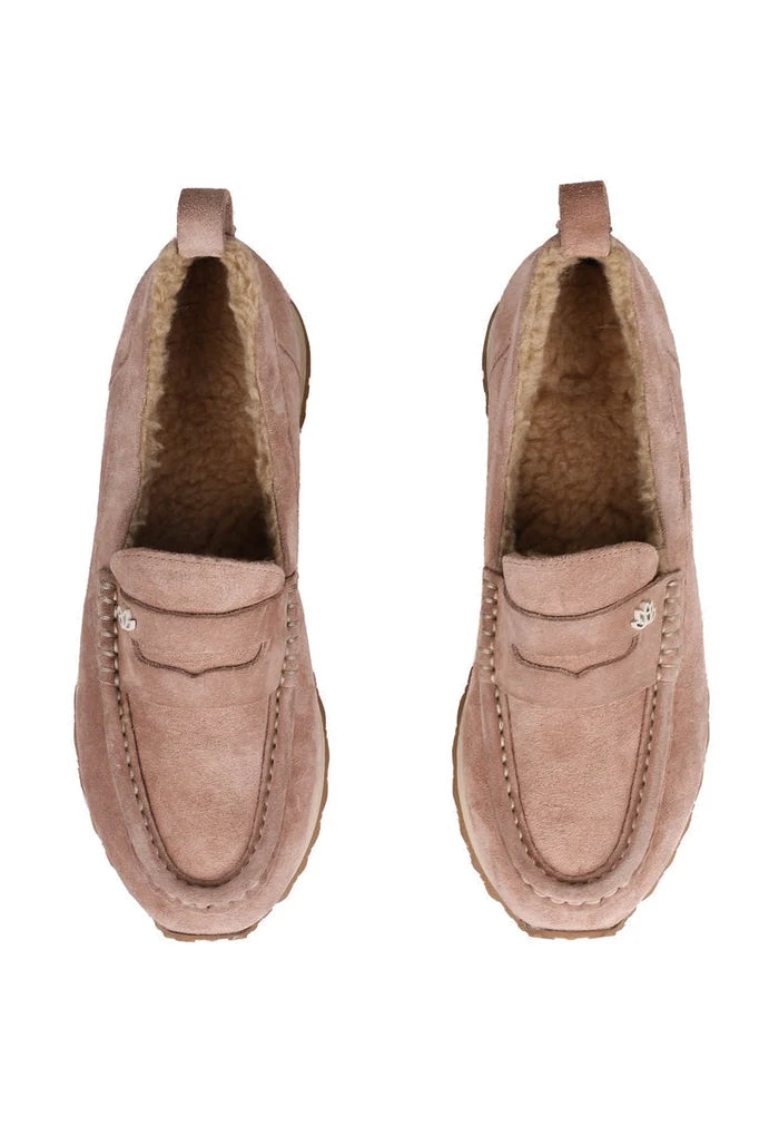 A pair of stylish beige suede platform loafers, ideal for women looking for comfortable and chic footwear.