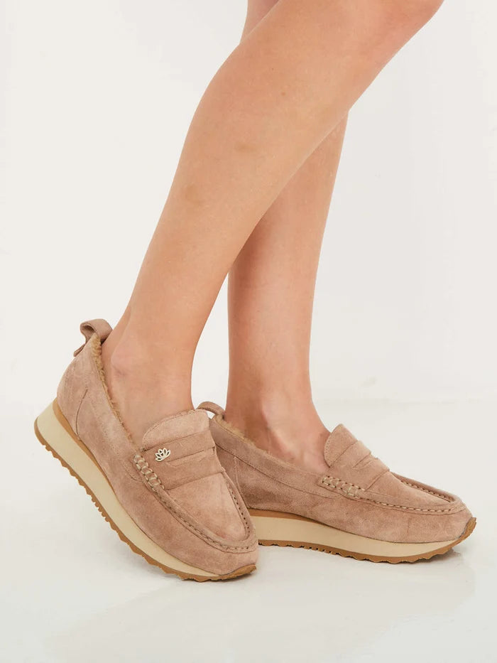 A pair of stylish beige suede platform loafers, perfect for women seeking comfortable and fashionable footwear.