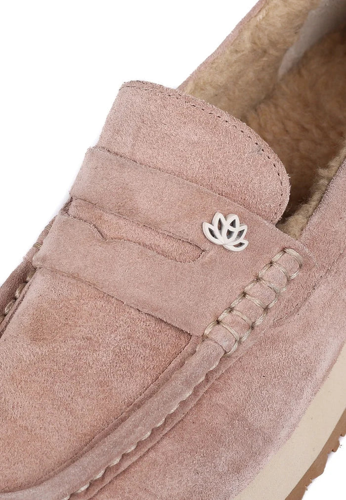 A pair of stylish beige suede platform loafers for women, offering both comfort and style.
