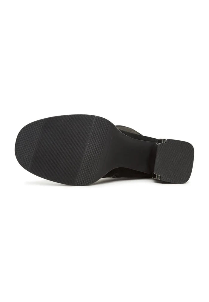 A pair of elegant black suede shoes, representing sophisticated and high-quality black dress footwear.