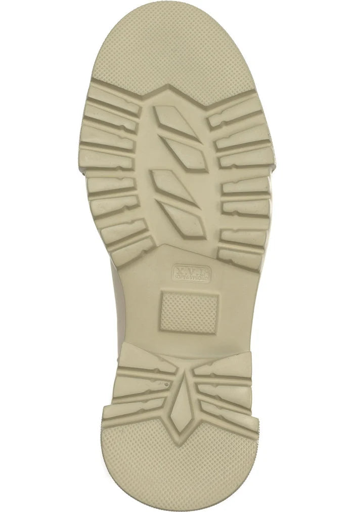 A stylish pair of tall leather boots with a chunky sole in beige, perfect fashion footwear for women.