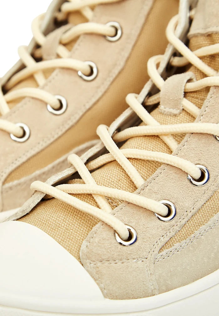 A stylish pair of lace-up high top sneakers with a unique textured design for a trendy look.