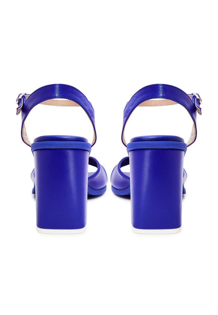 A pair of elegant blue block heels, the timeless and stylish choice for classic footwear.