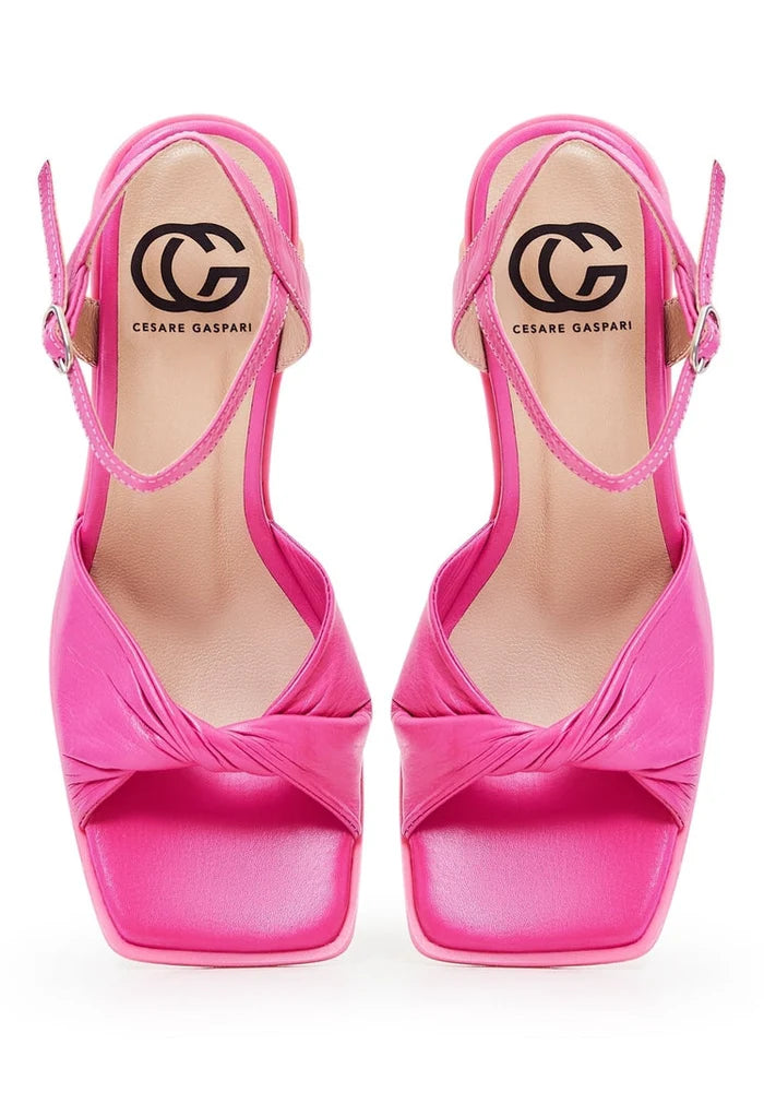 Stay chic and timeless with these stylish pink block heels, the ultimate classic footwear choice.