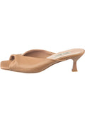 A stylish pair of Twist Luxe brown high heels for women, offering luxury and fashion in a trendy design.