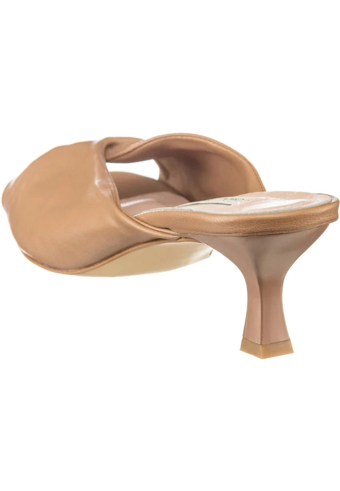 A pair of elegant Twist Luxe brown high heels for women, a luxurious and fashionable choice in footwear.