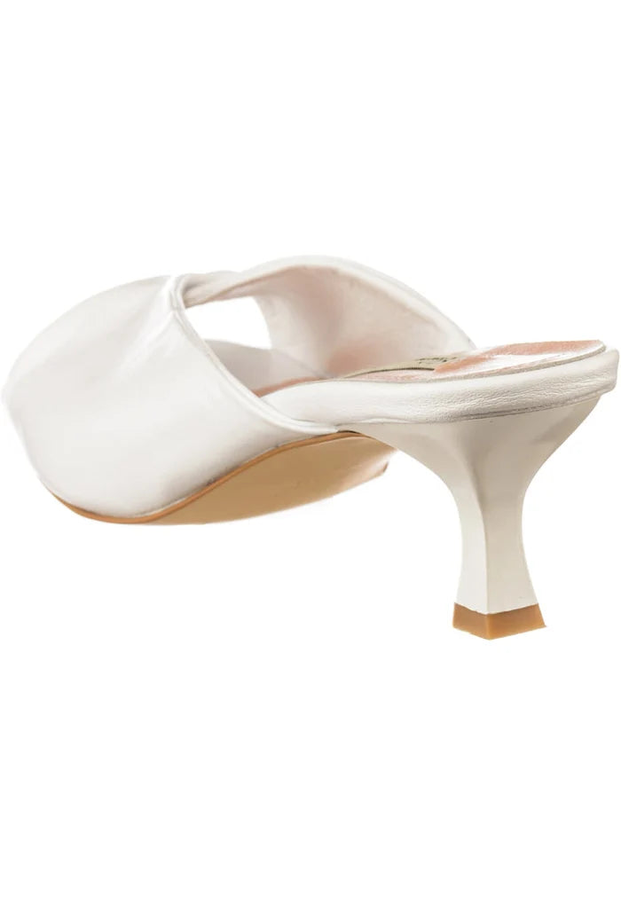 A stylish pair of white twist luxe high heels, perfect for adding a chic twist to your outfit.