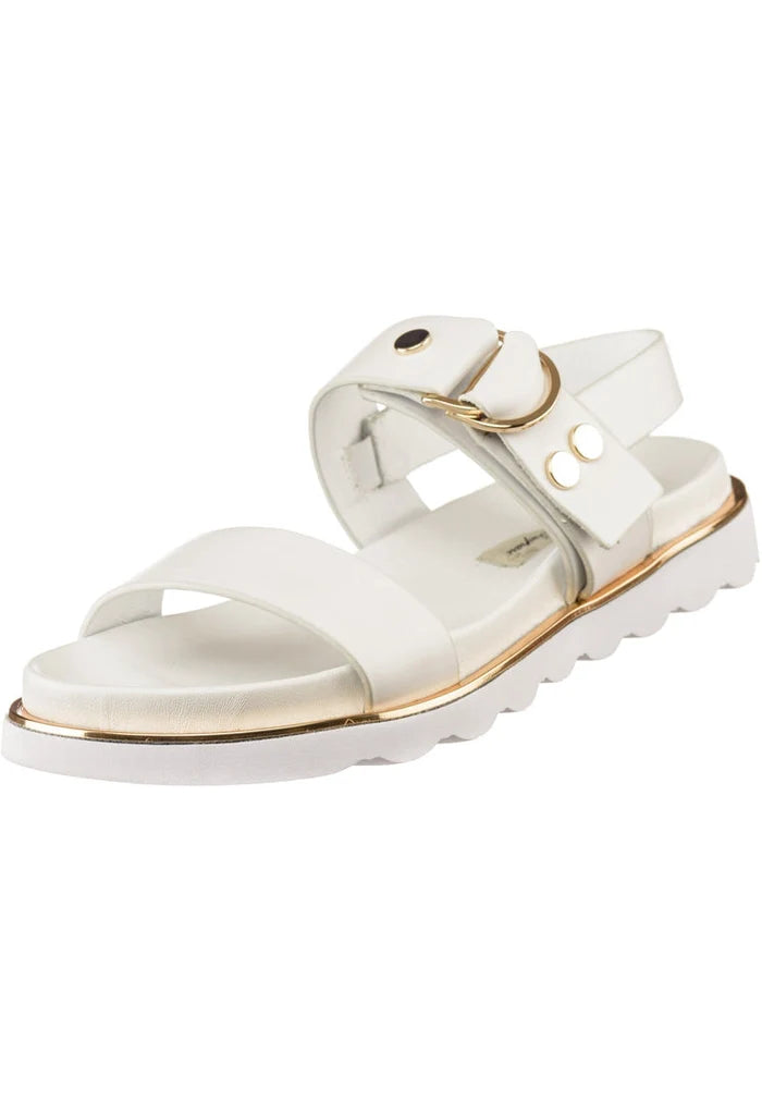 A stylish pair of white buckle sandals, perfect for urban chic looks. These women's white fashion sandals are trendy summer footwear essentials.
