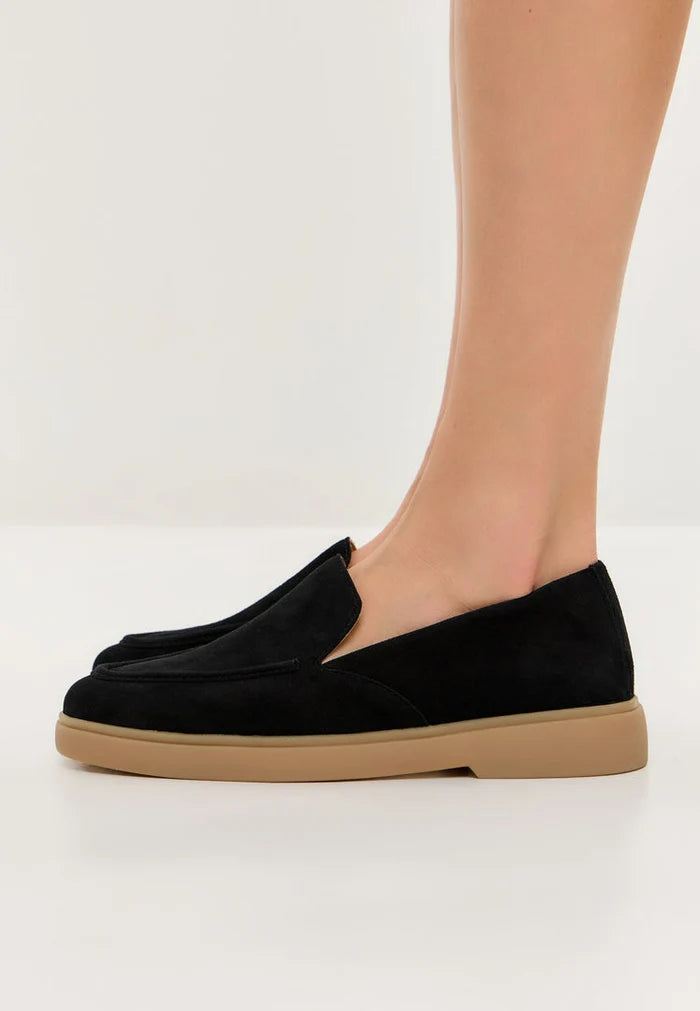 A stylish and comfortable pair of men's black loafers, perfect for urban ease.