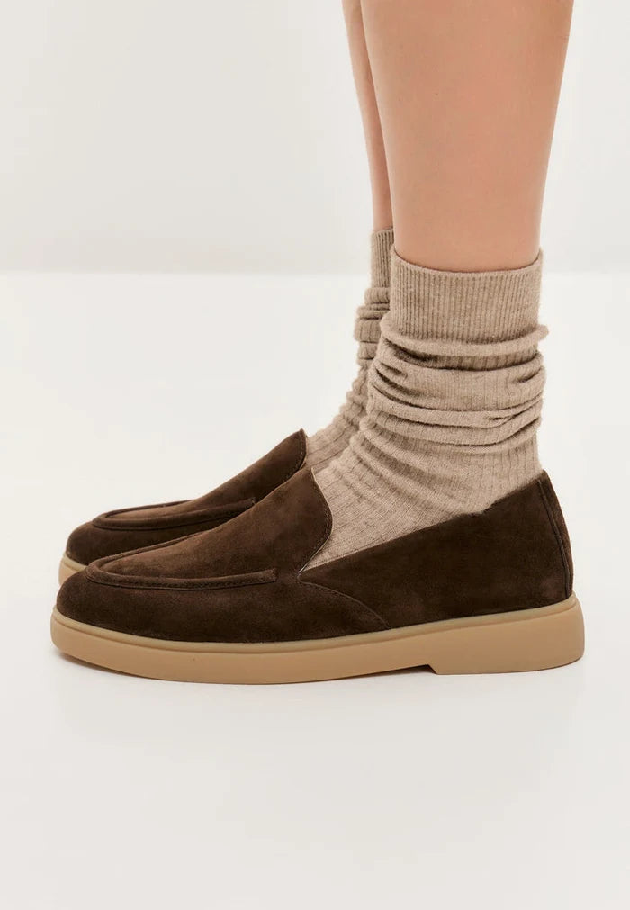 A pair of stylish and comfortable brown men's loafers, perfect for urban ease and casual footwear.