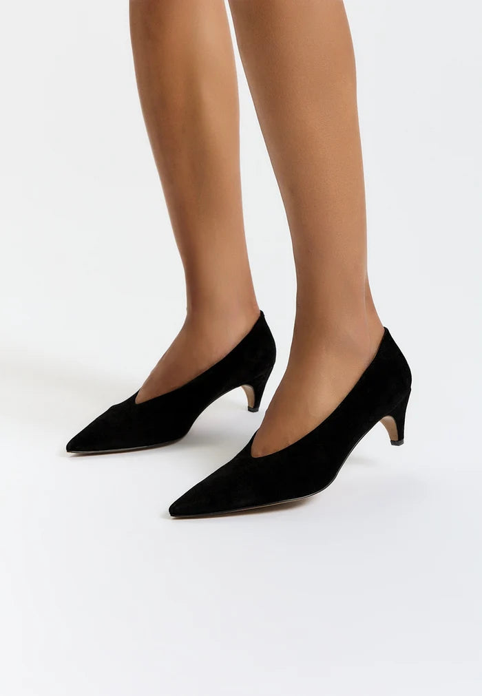 A chic pair of black velvet curve pumps, perfect for an elegant and trendy look