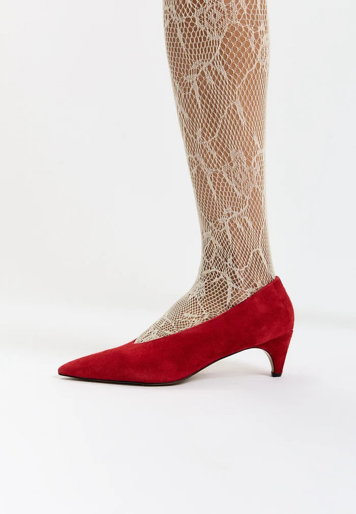 A pair of stunning red velvet curve pumps, women's heels that are perfect for any special occasion.