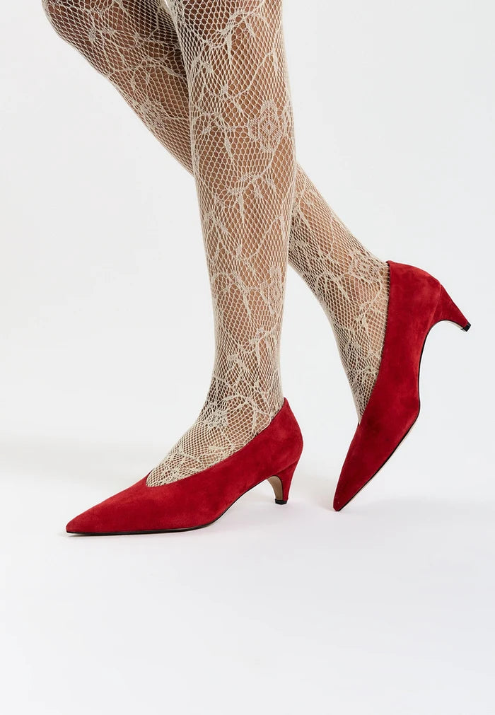 A pair of luxurious red velvet pumps with curves, perfect for women's high heel fashion.