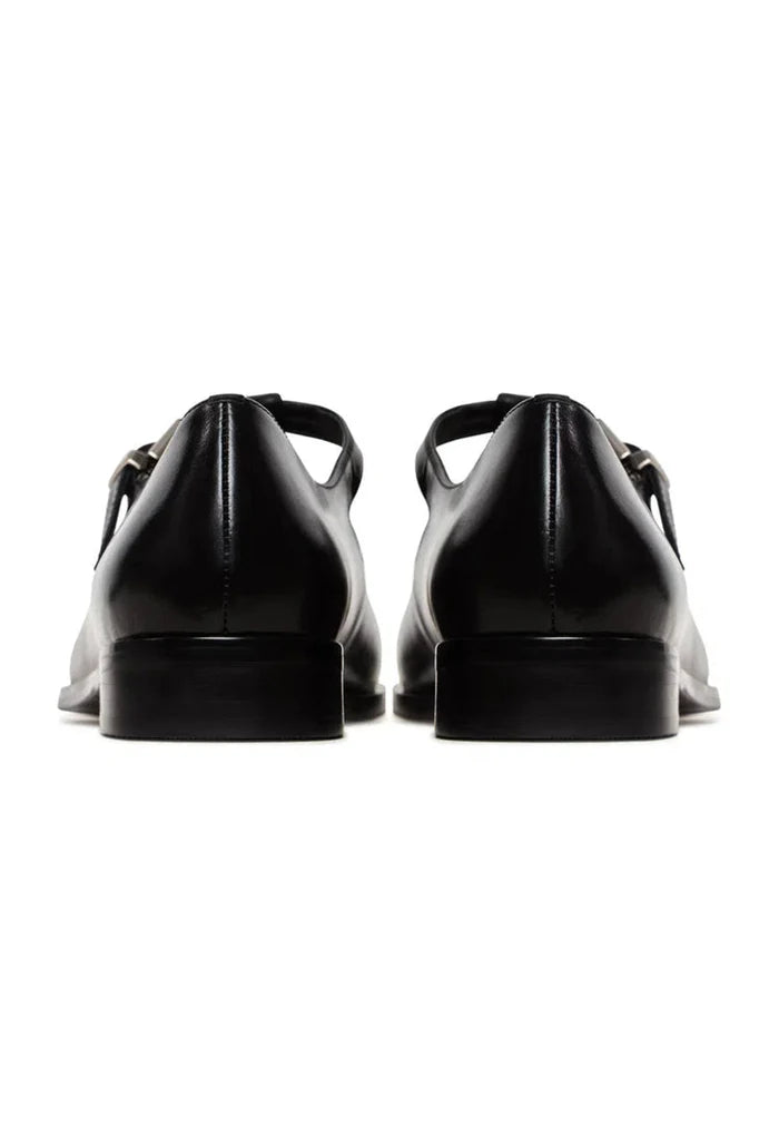 Step back in time with these vintage charm T-strap flats, the perfect blend of retro shoes and antique style footwear.