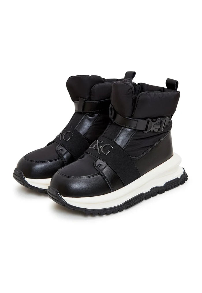 A pair of stylish black ankle sneaker boots, perfect for the winter season and fashion-forward looks.