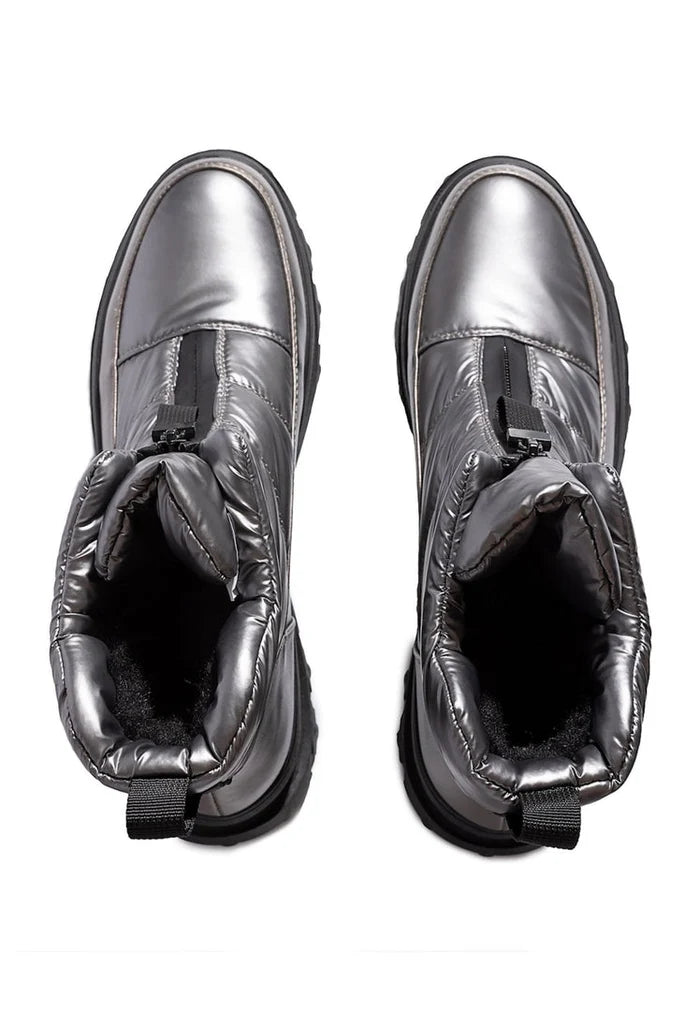 A pair of stylish silver insulated winter boots perfect for cold weather and snowy days