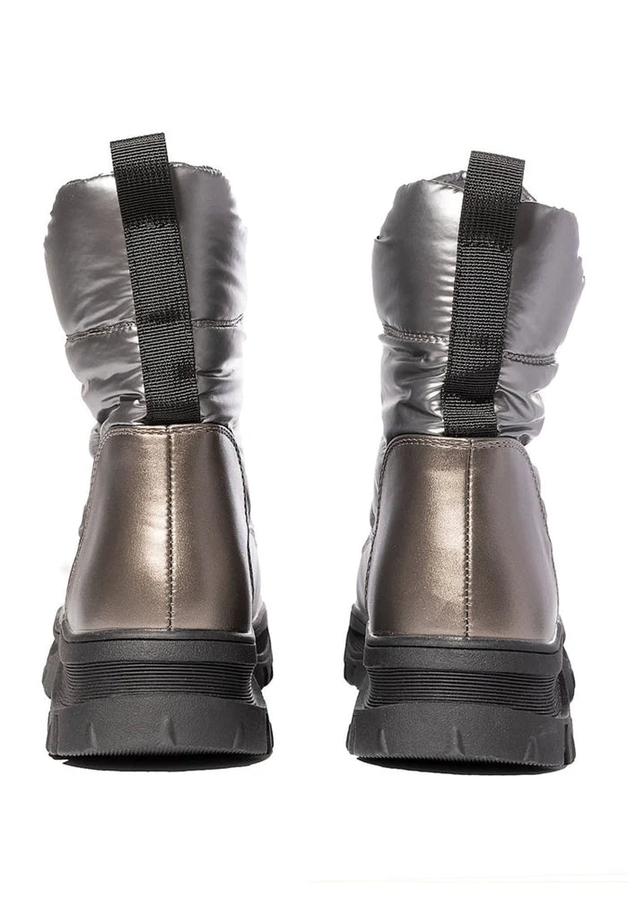 A pair of stylish silver winter boots designed to keep your feet warm and cozy in cold weather, perfect for snowy days.