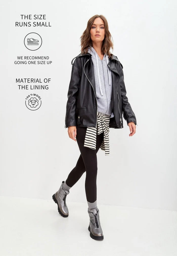 A pair of stylish silver winter boots, perfect for cold weather, snow, and staying warm in insulated comfort.