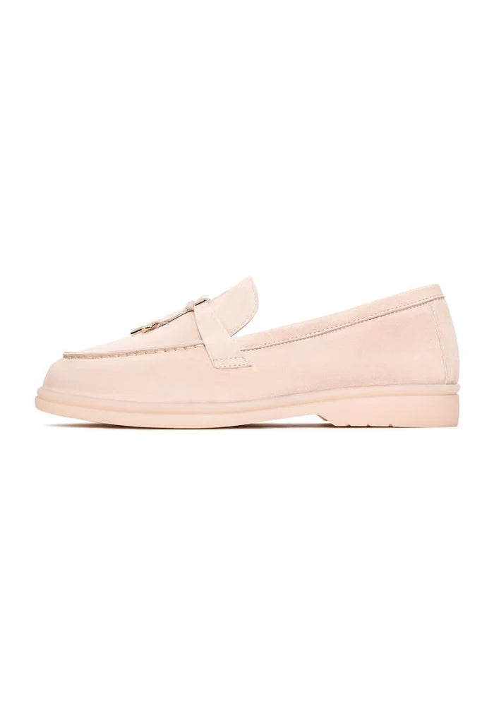 A pair of stylish beige Aemilia loafers, the perfect women's winter shoes for cold weather, featuring a cozy and chic design.