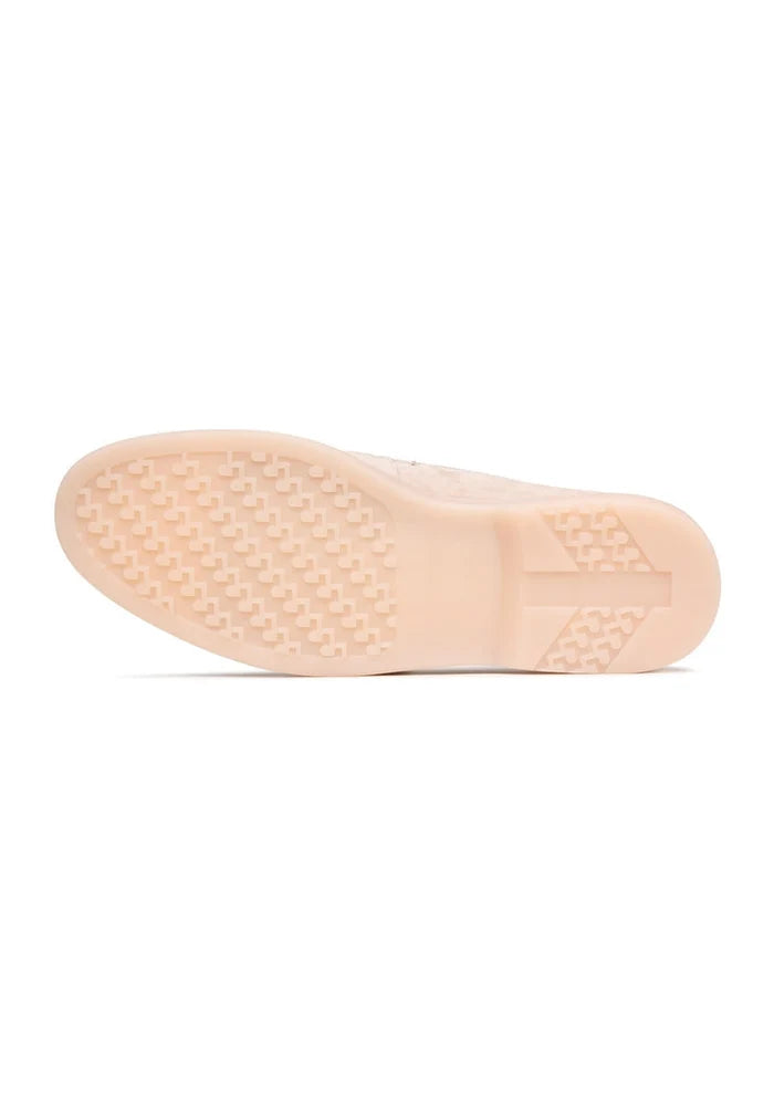 A pair of stylish beige Aemilia loafers, perfect women's winter shoes for cold weather, with a focus on winter loafers.