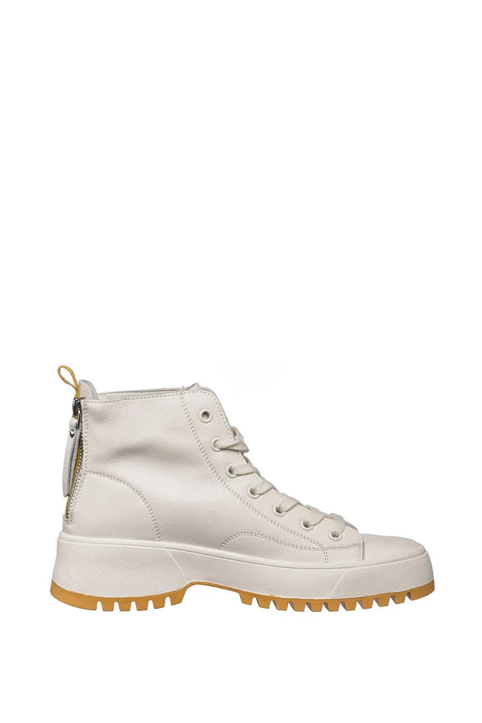 A close-up image showing detailed leather ankle boots with zipper accent on the front.